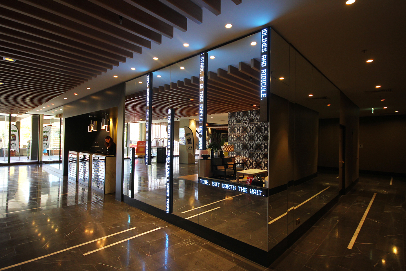 QT Hotel Foyer Artwork Installation Mirror and LED Wall