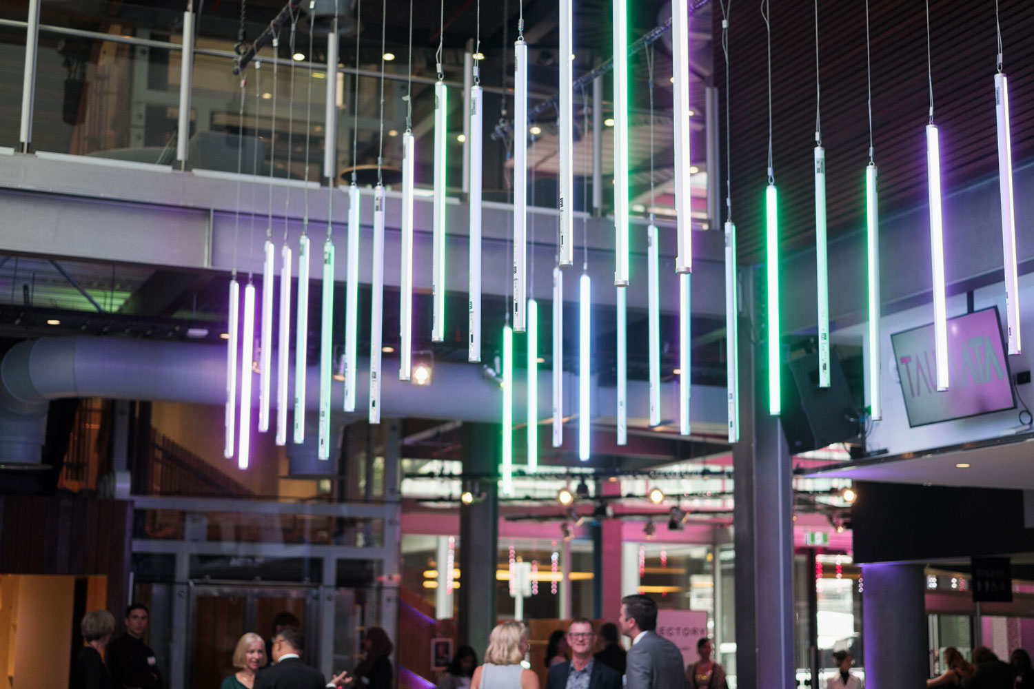 ASTERA titan tubes suspended from event space ceilings